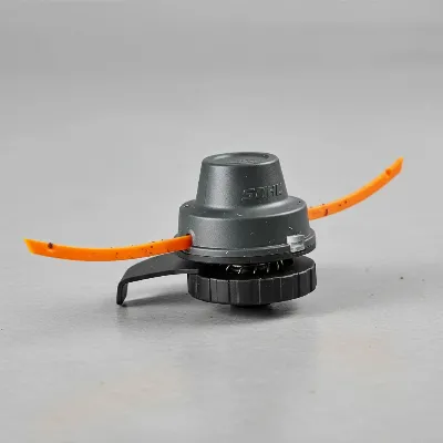 Detailed view of the Stihl FS 56 RC-E's AutoCut cutting head with trimmer line